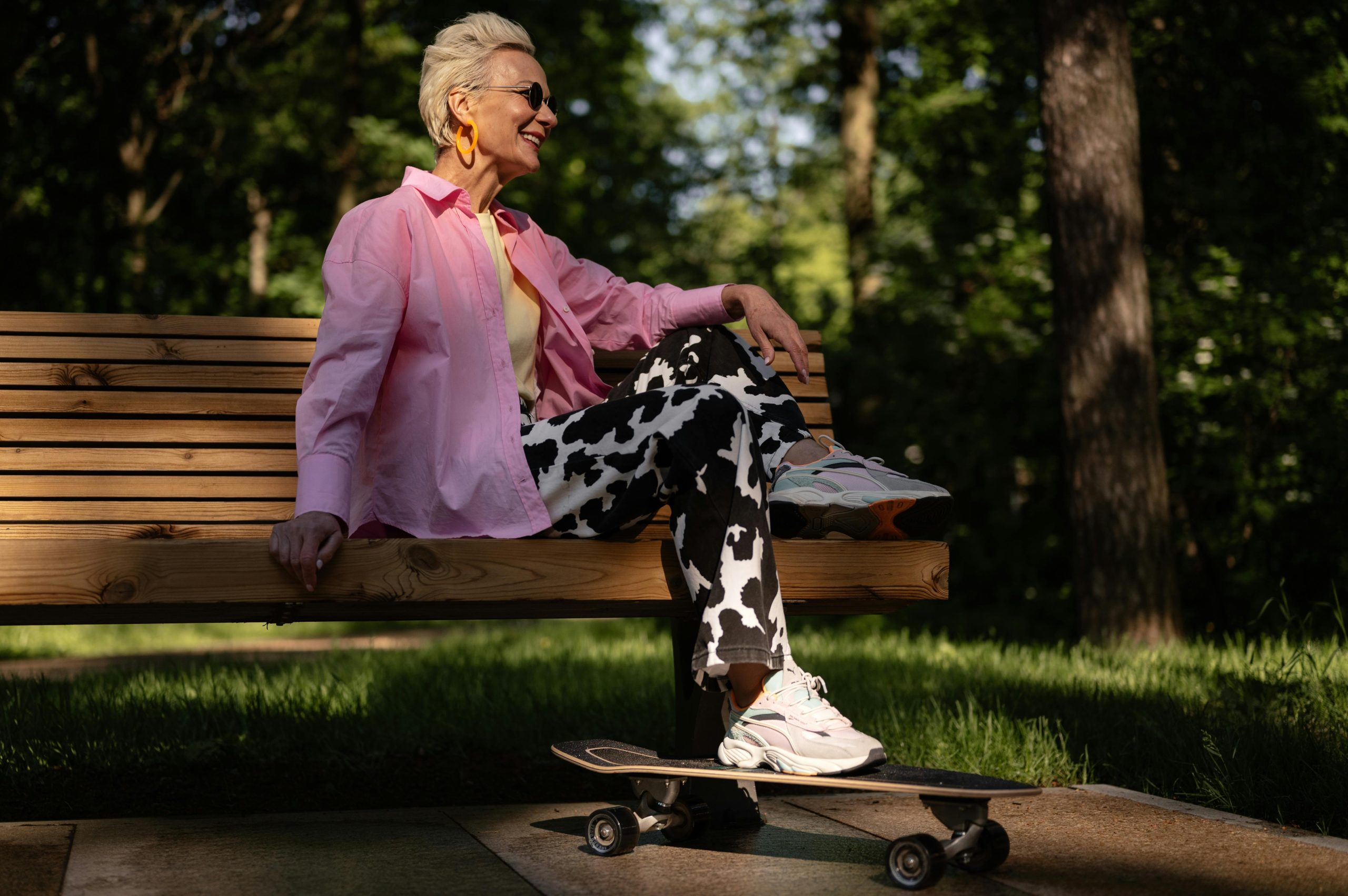 elderly relaxing under the heat of the sun with skateboard